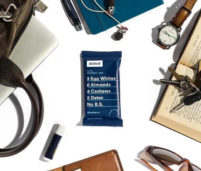 An RXBAR with work related items surrounding